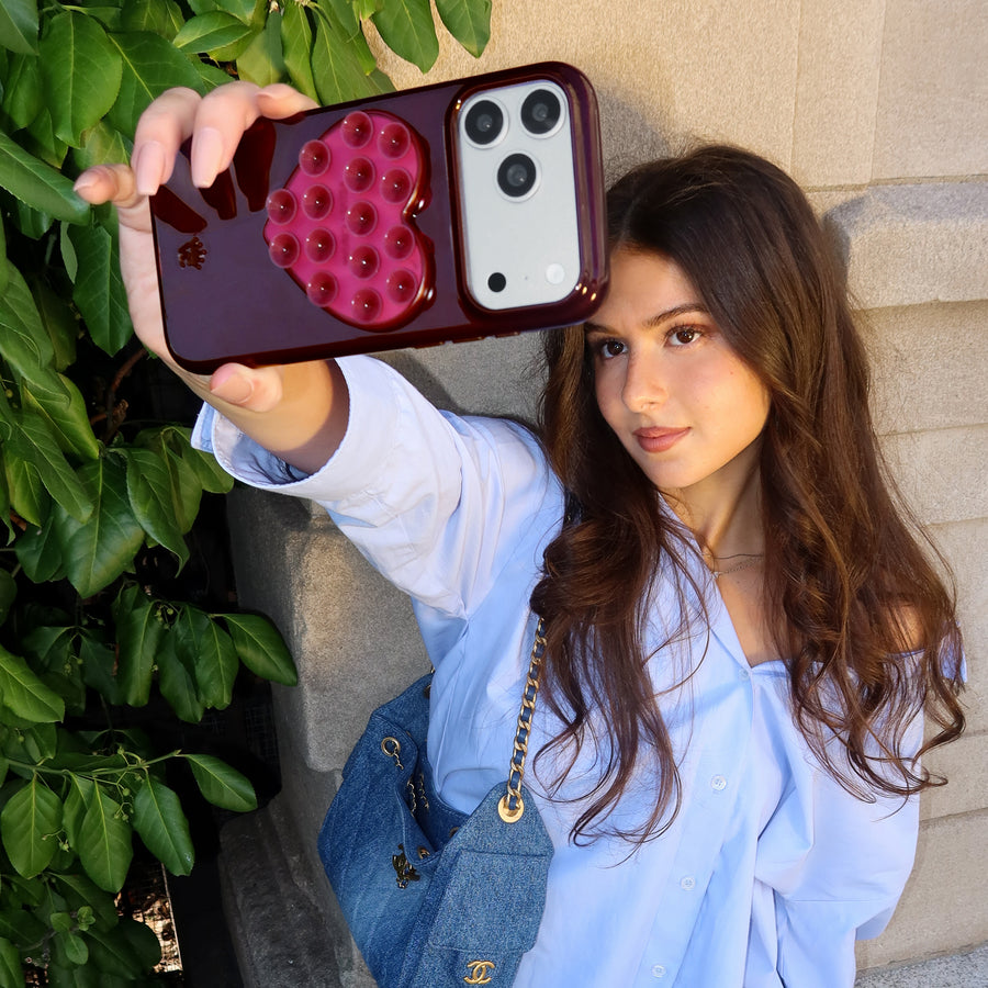 Burgundy Jelly Heart MagSafe MirrorGrip lifestyle