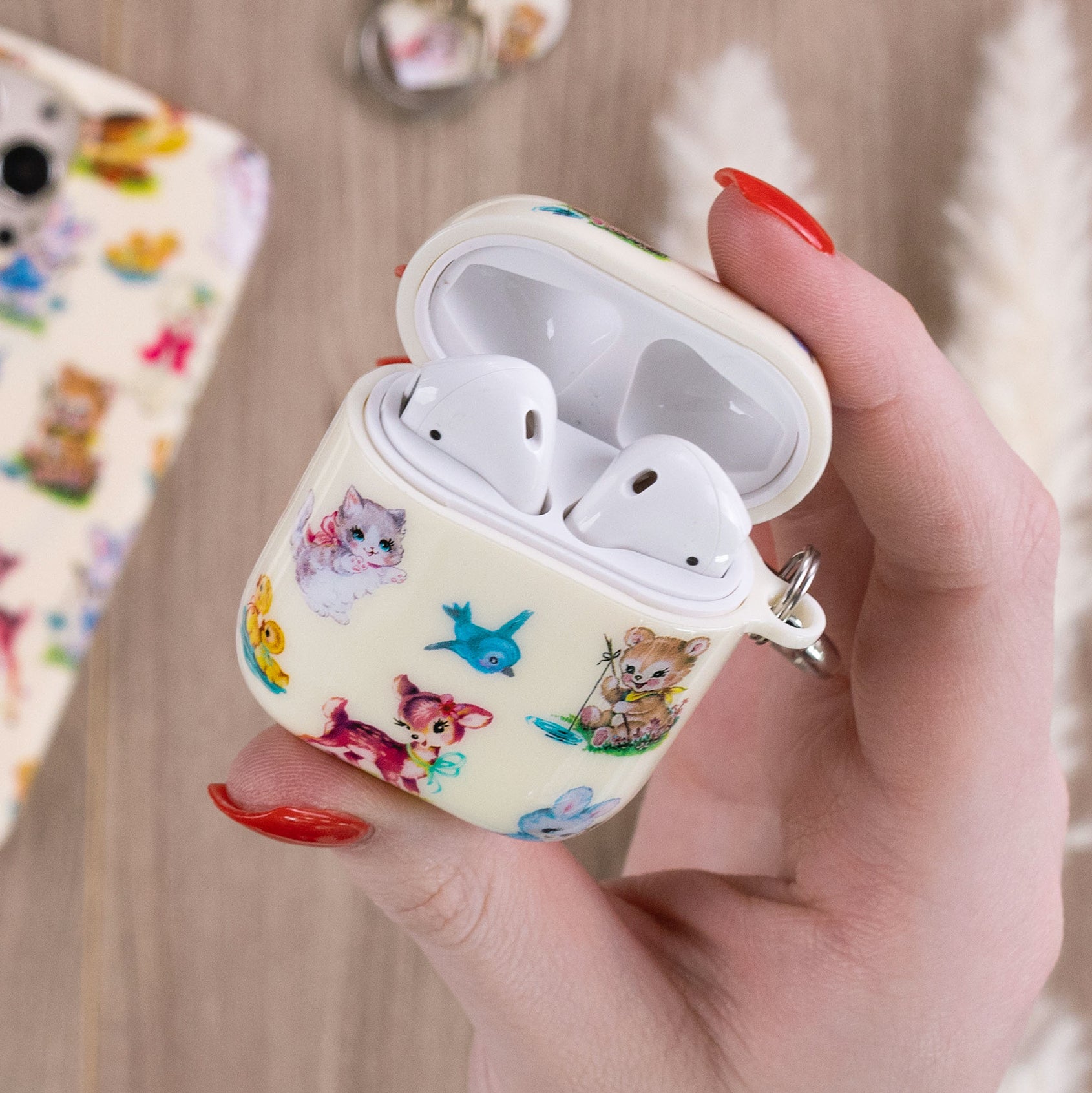 Louis Vuitton Has Animal-Themed Earpods Cases That Are Super Cute
